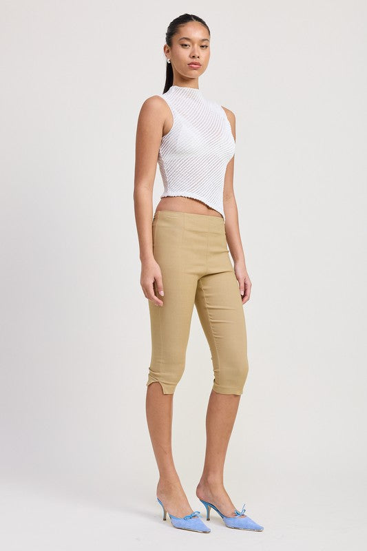 SLEEVELESS ASYMMETRICAL HIGH NECK TOP