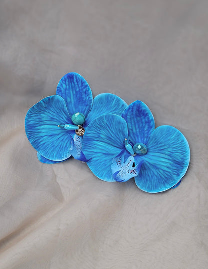 Aretes florales edición limitada en tono azul tropical – Trish T CoCo"